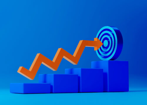Orange arrow pointing upward towards a target on blue blocks, symbolizing growth and success in a 3D illustration.